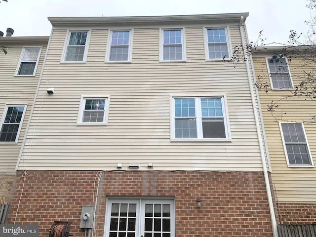 view of home's exterior featuring brick siding
