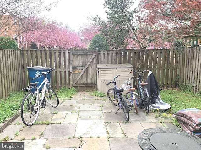view of patio with a gate and a fenced backyard