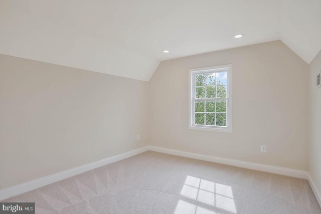 bonus room with carpet floors, recessed lighting, baseboards, and lofted ceiling