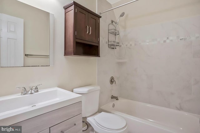 bathroom featuring vanity, toilet, and shower / tub combination