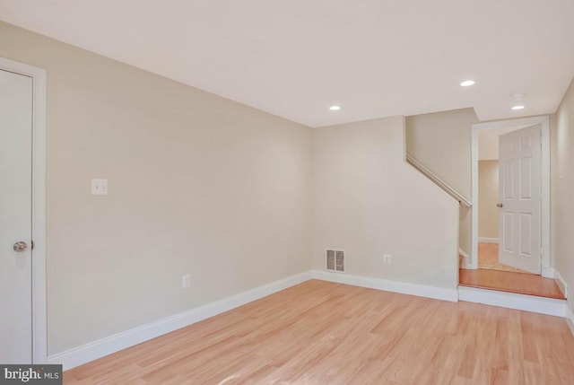 interior space featuring visible vents, stairway, baseboards, recessed lighting, and light wood-style flooring