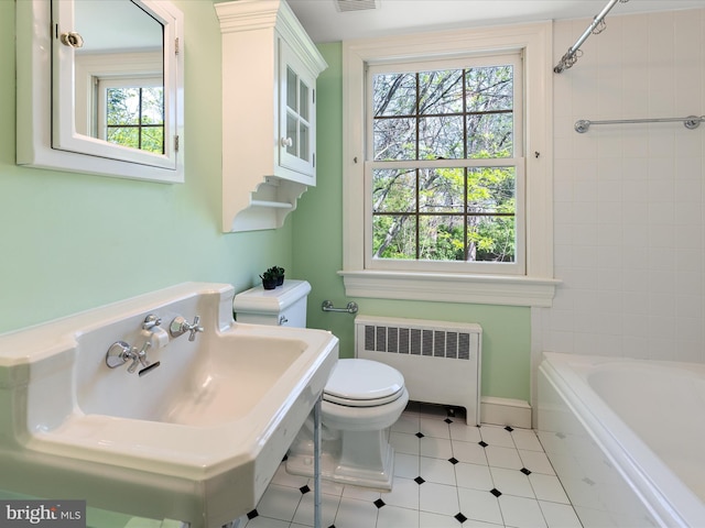 bathroom with tile patterned flooring, visible vents, toilet, radiator heating unit, and shower / bathing tub combination