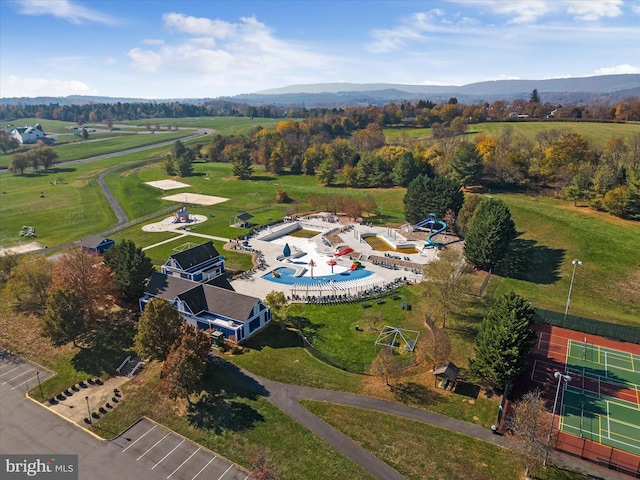 birds eye view of property featuring a mountain view