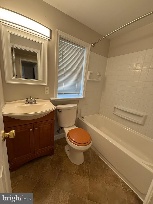 515 Wood St, Baltimore, MD 21225 - bathroom featuring toilet, tub / shower combination, and vanity