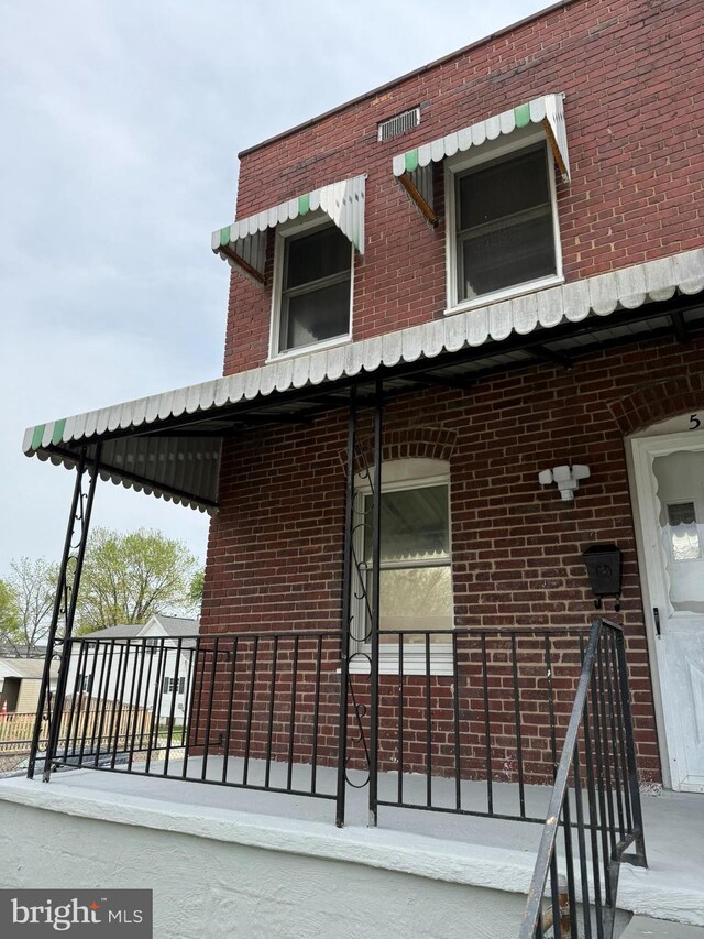 515 Wood St, Baltimore, MD 21225 - view of property exterior with brick siding