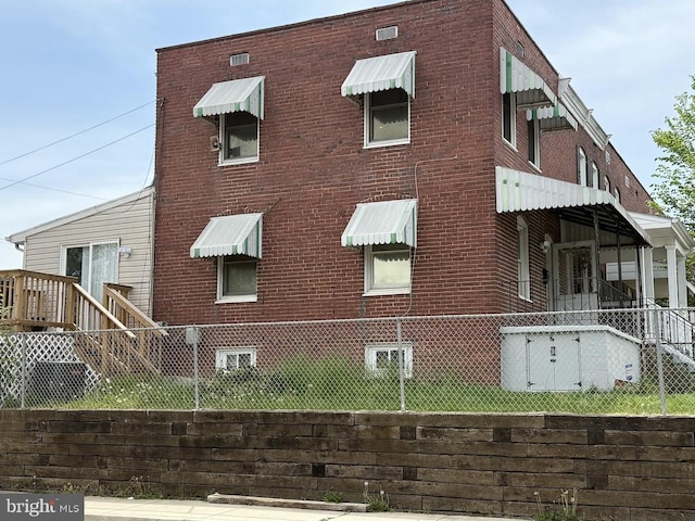 515 Wood St, Baltimore, MD 21225 - view of side of property featuring brick siding