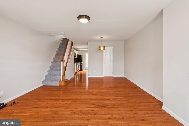 1720 Alter St, Philadelphia, PA 19146 - interior space with baseboards, light wood finished floors, and stairs