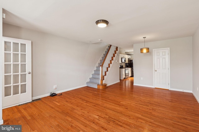 1720 Alter St, Philadelphia, PA 19146 - empty room with baseboards, wood finished floors, and stairs