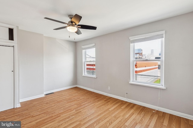 1720 Alter St, Philadelphia, PA 19146 - spare room with visible vents, baseboards, wood finished floors, and ceiling fan