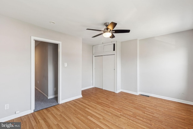 1720 Alter St, Philadelphia, PA 19146 - unfurnished bedroom with a closet, light wood finished floors, baseboards, and ceiling fan