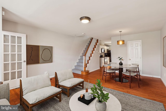 1720 Alter St, Philadelphia, PA 19146 - living area featuring stairway, baseboards, and wood finished floors