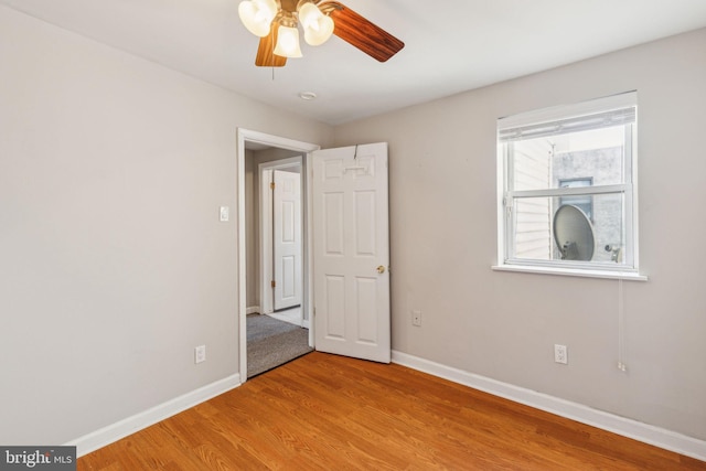 1720 Alter St, Philadelphia, PA 19146 - unfurnished bedroom with light wood finished floors, baseboards, and ceiling fan