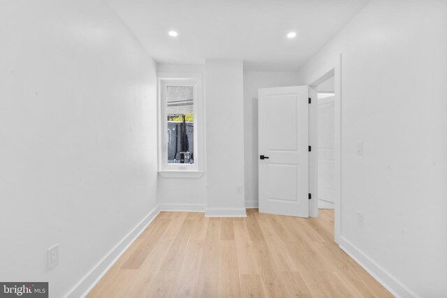 interior space with recessed lighting, light wood-type flooring, and baseboards