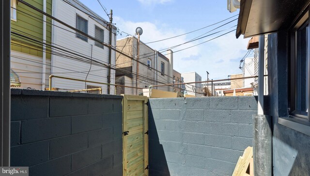 view of home's exterior featuring fence