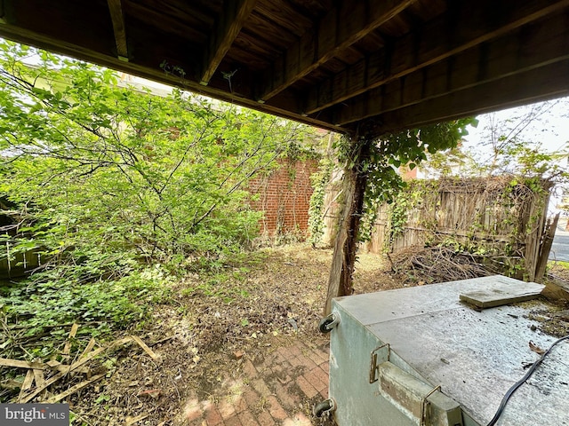 view of yard with fence and a patio area