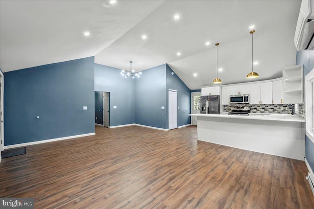 696 Burger Hollow Rd, Kunkletown, PA 18058 - kitchen with open shelves, open floor plan, appliances with stainless steel finishes, white cabinets, and dark wood-style flooring
