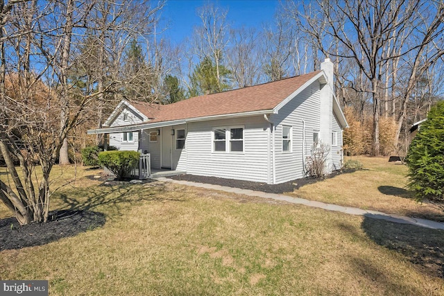 696 Burger Hollow Rd, Kunkletown, PA 18058 - ranch-style house with a front lawn, a chimney, and roof with shingles