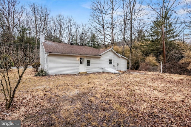696 Burger Hollow Rd, Kunkletown, PA 18058 - back of property with a chimney and a shingled roof