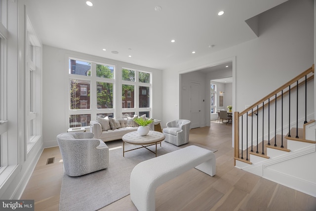 227 S Union St, Alexandria, VA 22314 - living room with visible vents, stairway, baseboards, light wood finished floors, and recessed lighting