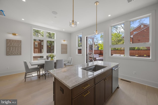 227 S Union St, Alexandria, VA 22314 - kitchen featuring a sink, pendant lighting, recessed lighting, and a wealth of natural light