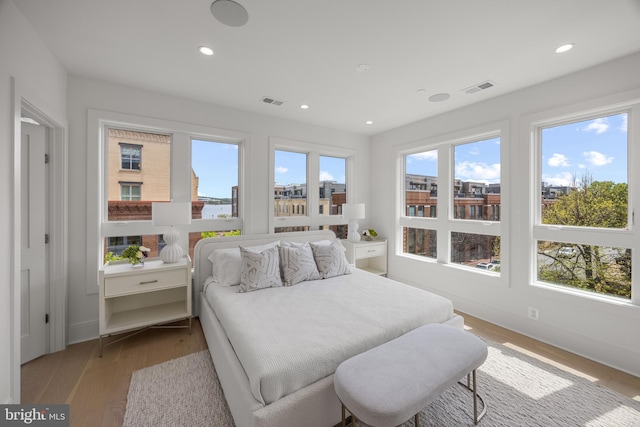 227 S Union St, Alexandria, VA 22314 - bedroom with visible vents, recessed lighting, light wood-style flooring, and baseboards
