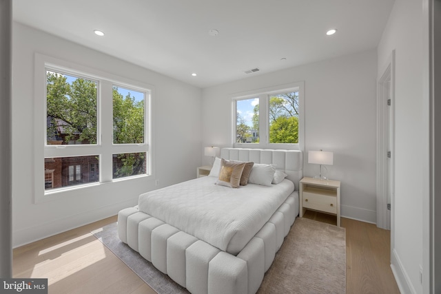 227 S Union St, Alexandria, VA 22314 - bedroom with baseboards, recessed lighting, light wood-style flooring, and visible vents