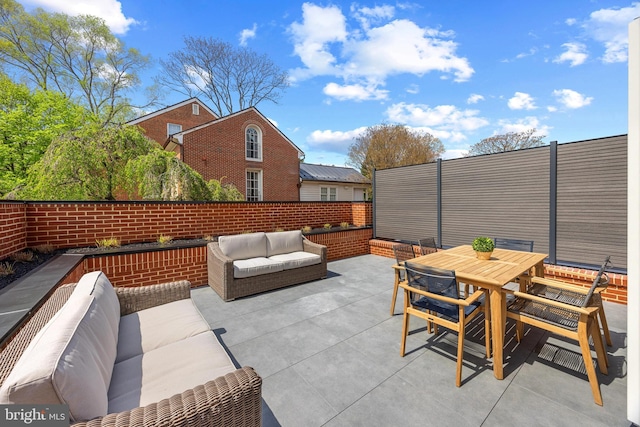 227 S Union St, Alexandria, VA 22314 - view of patio / terrace featuring an outdoor living space, outdoor dining area, and fence