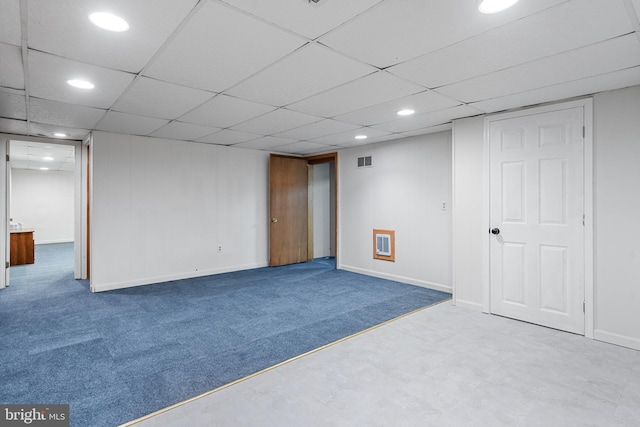 finished basement with carpet flooring, recessed lighting, visible vents, and a drop ceiling