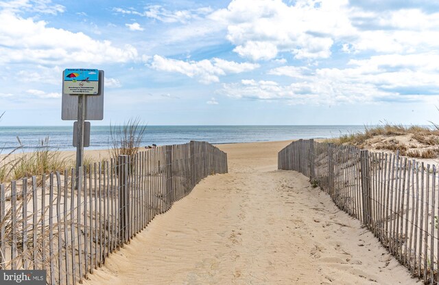 12808 Coastal Hwy Unit 206, Ocean City, MD 21842 - water view featuring fence and a beach view