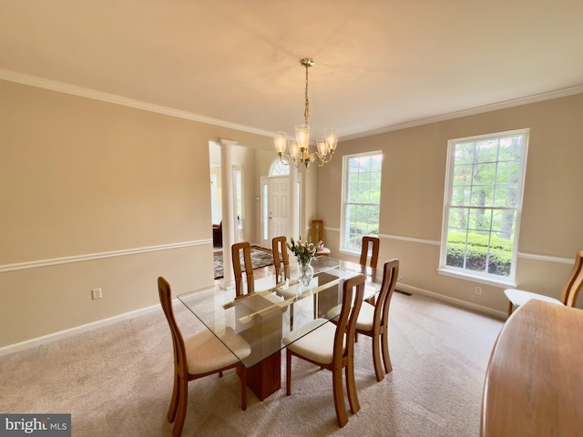 14100 Twisting Ln, Dayton, MD 21036 - carpeted dining space featuring baseboards, crown molding, a chandelier, and decorative columns