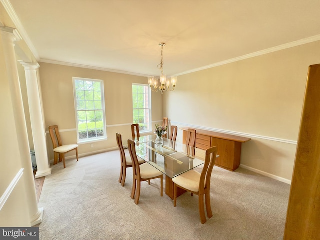 14100 Twisting Ln, Dayton, MD 21036 - dining space featuring ornamental molding, light colored carpet, a chandelier, baseboards, and ornate columns