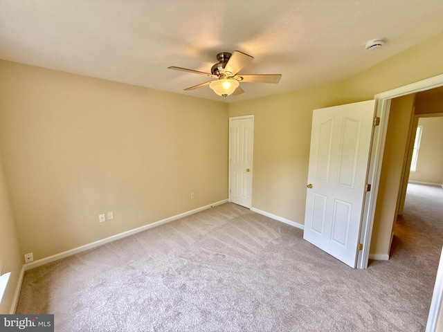 14100 Twisting Ln, Dayton, MD 21036 - unfurnished bedroom with light colored carpet, baseboards, and ceiling fan