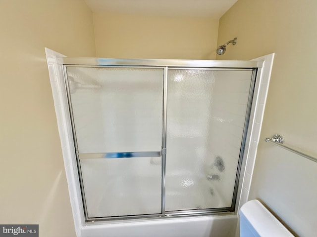 14100 Twisting Ln, Dayton, MD 21036 - full bath featuring toilet and bath / shower combo with glass door