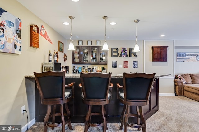 bar featuring a dry bar, baseboards, recessed lighting, and carpet floors