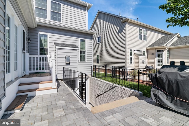 view of patio / terrace with fence