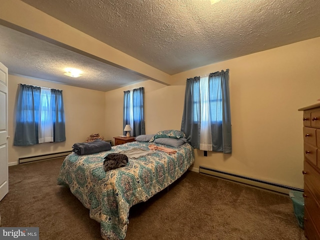 bedroom with carpet floors, a baseboard radiator, baseboard heating, baseboards, and a textured ceiling