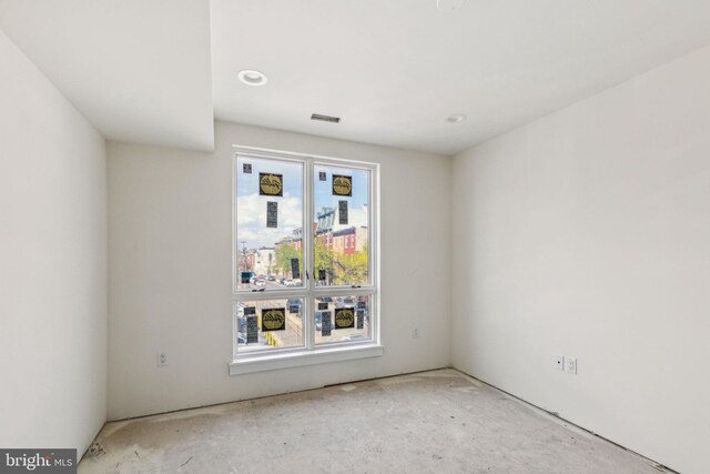 empty room featuring recessed lighting and visible vents