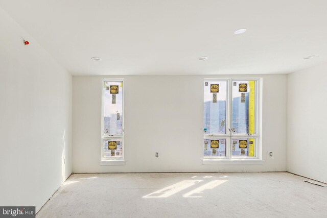 empty room with recessed lighting