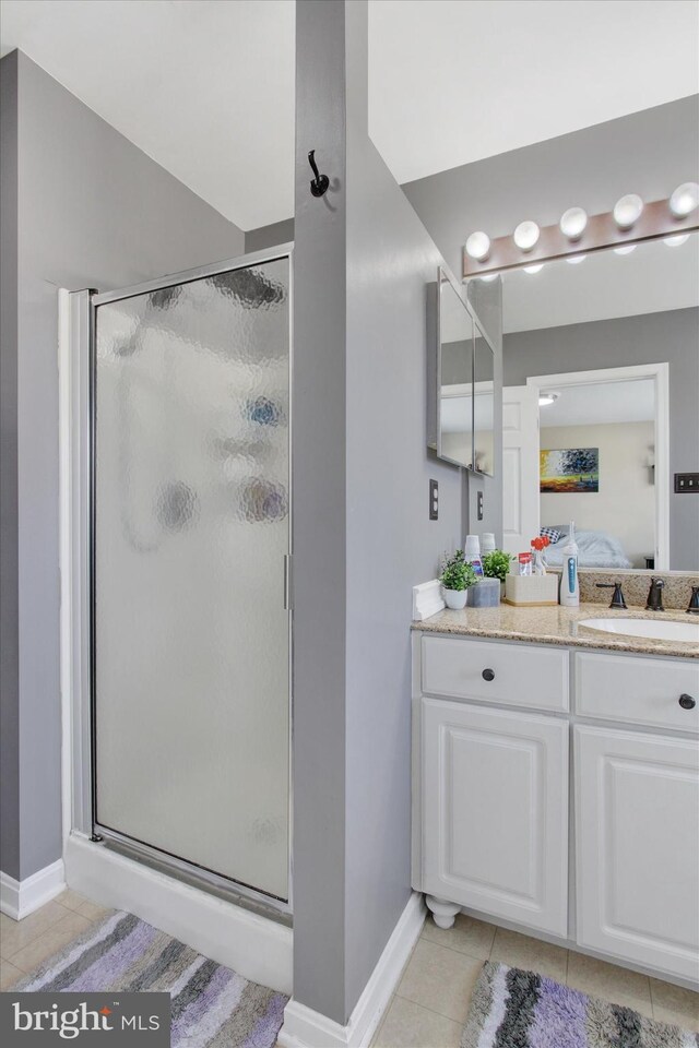 1425 Wanda Dr, Hanover, PA 17331 - ensuite bathroom featuring baseboards, ensuite bath, and tile patterned floors