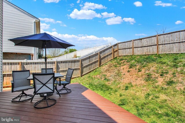 1425 Wanda Dr, Hanover, PA 17331 - wooden deck featuring outdoor dining area and a fenced backyard