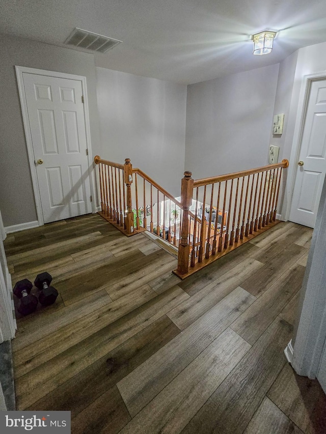17616 Chisholm Ln, Dumfries, VA 22026 - staircase with wood finished floors