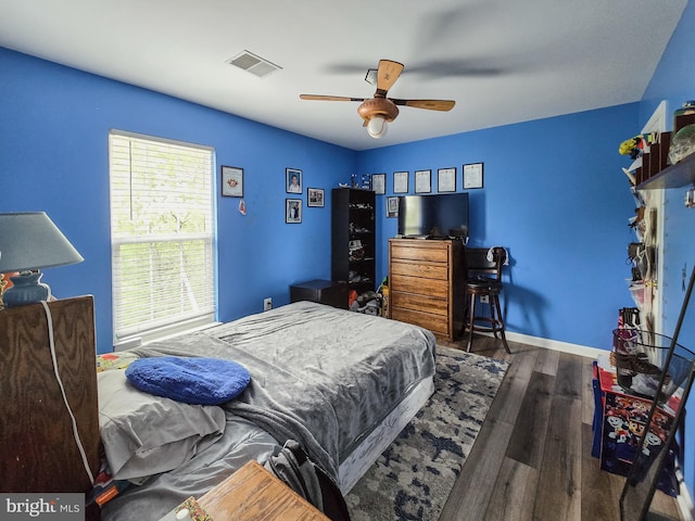 17616 Chisholm Ln, Dumfries, VA 22026 - bedroom featuring wood finished floors, baseboards, and a ceiling fan