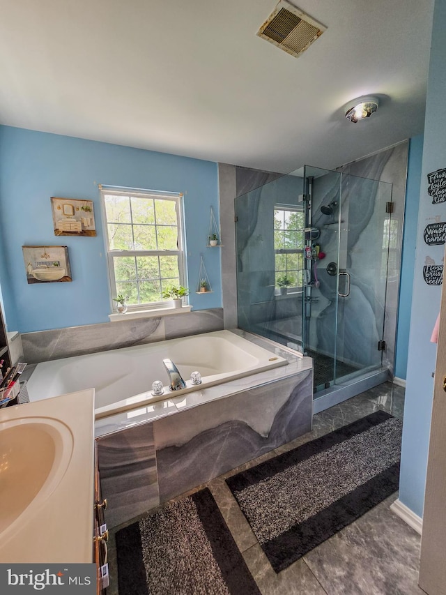 17616 Chisholm Ln, Dumfries, VA 22026 - bathroom with a shower stall, a bath, and vanity