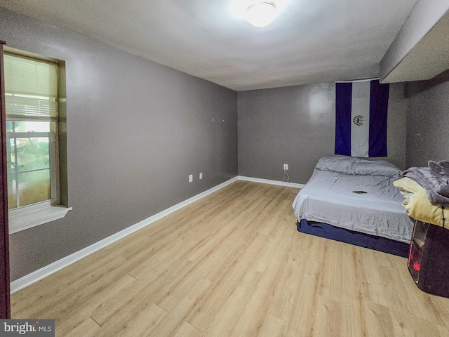 17616 Chisholm Ln, Dumfries, VA 22026 - bedroom with wood finished floors and baseboards