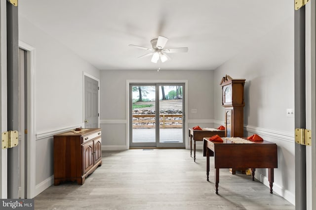 entryway featuring ceiling fan and light wood-style flooring