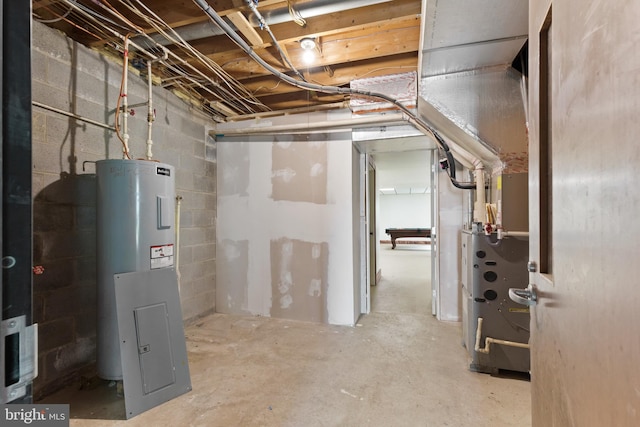 unfinished below grade area with concrete block wall and electric water heater