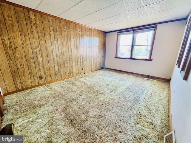 2633 Levick St, Philadelphia, PA 19149 - spare room featuring carpet floors, visible vents, wood walls, and baseboards