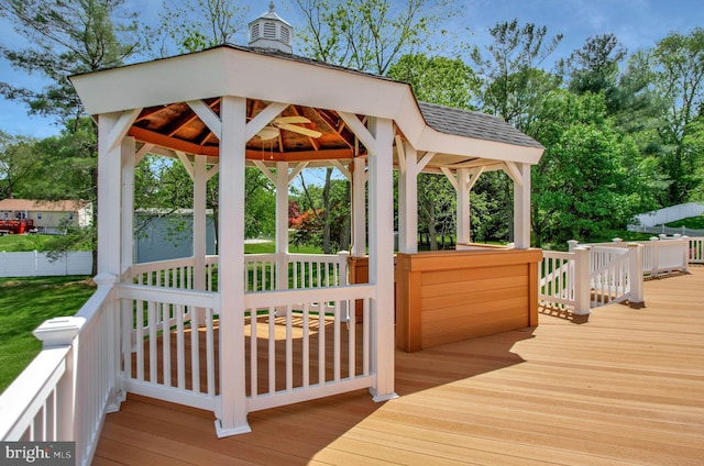 wooden terrace with a gazebo