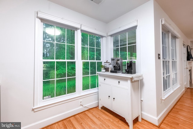 1541 Church Hill Pl Unit 1541, Reston, VA 20194 - doorway with light wood finished floors and baseboards