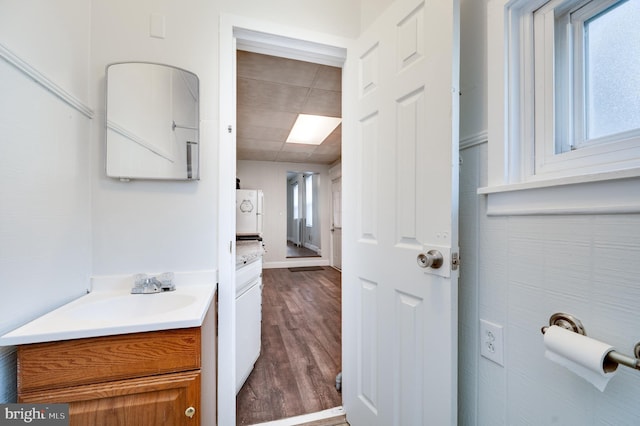 bathroom featuring wood finished floors and vanity